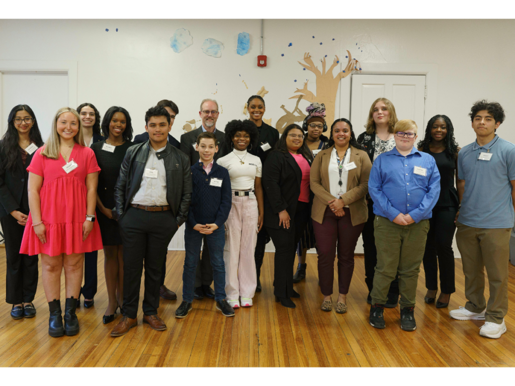 Photo of 15 youth and two adults at the first meeting of the Youth Council